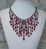 Crystals Galore Necklace In Red And Gunmetal