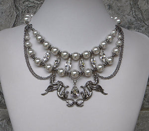 Griffins in white pearls and silver necklace