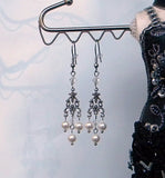 Griffins in white pearls chandelier earrings